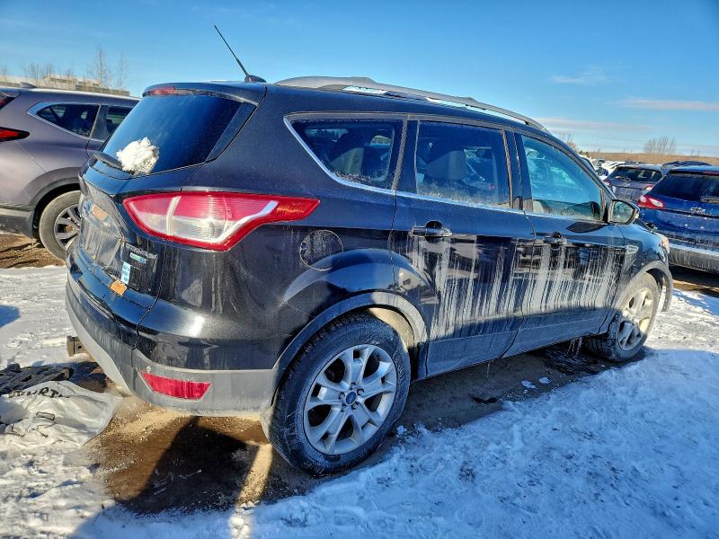 Photo 3 from auction – 2014 FORD ESCAPE TIT with VIN 1FMCU9J96EUD04044