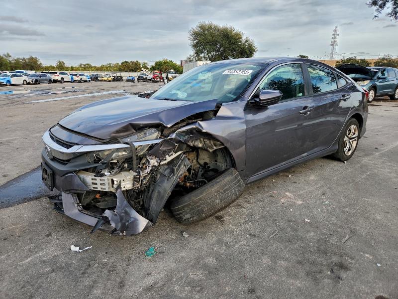 HONDA CIVIC 2018 with VIN 19XFC2F55JE030247 - Photo from auction
