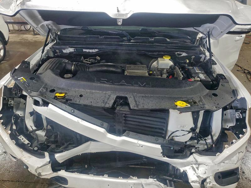 Photo 11 from auction – 2021 RAM 1500 with VIN 1C6SRFRT8MN663430