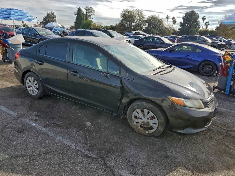 Photo 4 from auction – 2012 HONDA CIVIC LX with VIN 19XFB2F5XCE310669