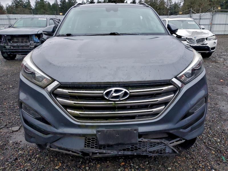 Photo 5 from auction – 2016 HYUNDAI TUCSON LIM with VIN KM8J3CA21GU117467