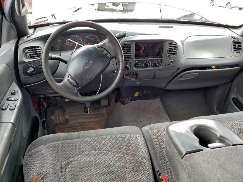 Photo 8 from auction – 2000 FORD F150 with VIN 1FTRX18L3YNA75796