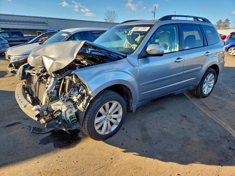 SUBARU FORESTER 2 2011 with VIN JF2SHACC0BH772095 - Photo from auction