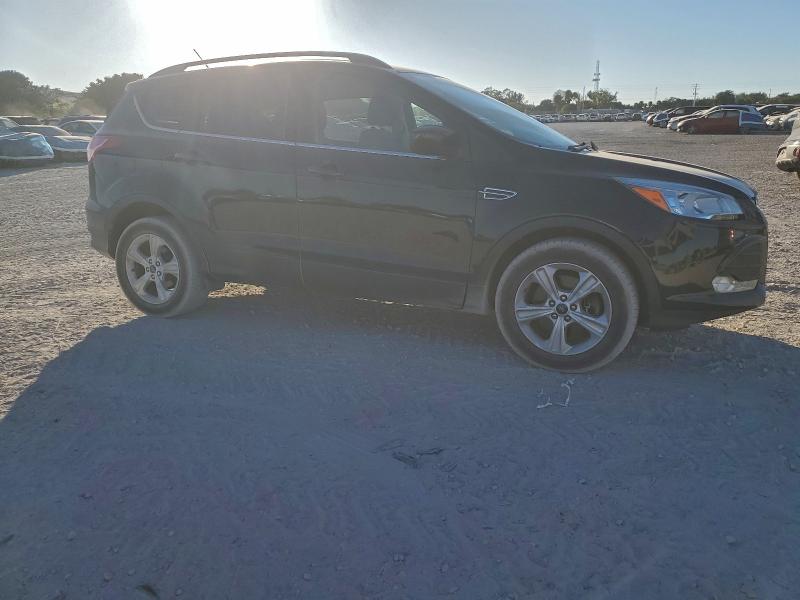 Foto 4 de la subasta – 2016 FORD ESCAPE SE con VIN 1FMCU9GX3GUA07855