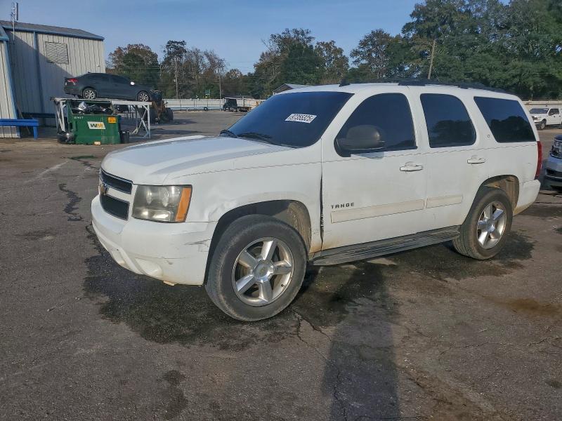 CHEVROLET TAHOE 2010 with VIN 1GNUCBE04AR290759 - Photo from auction