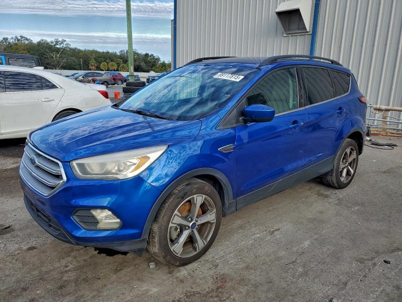 FORD ESCAPE SE 2017 with VIN 1FMCU0G99HUE86393 - Photo from auction