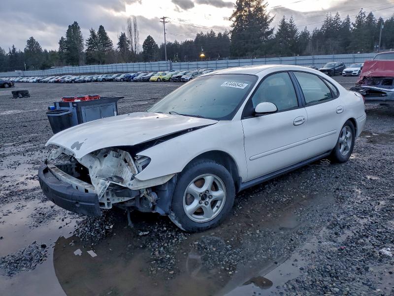 FORD TAURUS 2002 with VIN 1FAFP53U52G138599 - Photo from auction