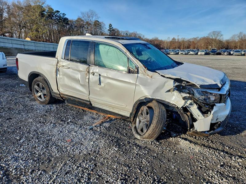 Photo 4 from auction – 2022 HONDA RIDGELINE with VIN 5FPYK3F59NB037341