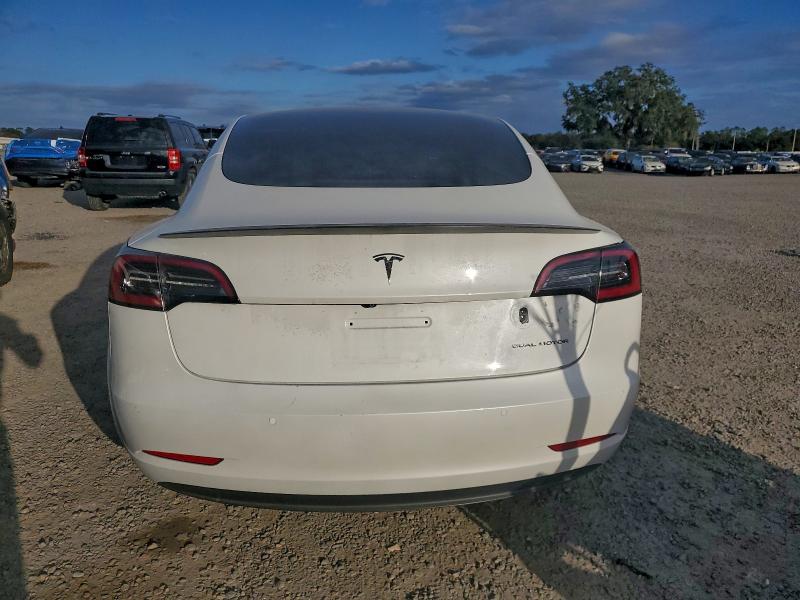 Photo 6 from auction – 2022 TESLA MODEL 3 with VIN 5YJ3E1EB8NF105098