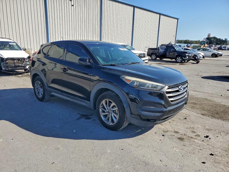Photo 4 from auction – 2016 HYUNDAI TUCSON SE with VIN KM8J23A45GU161542