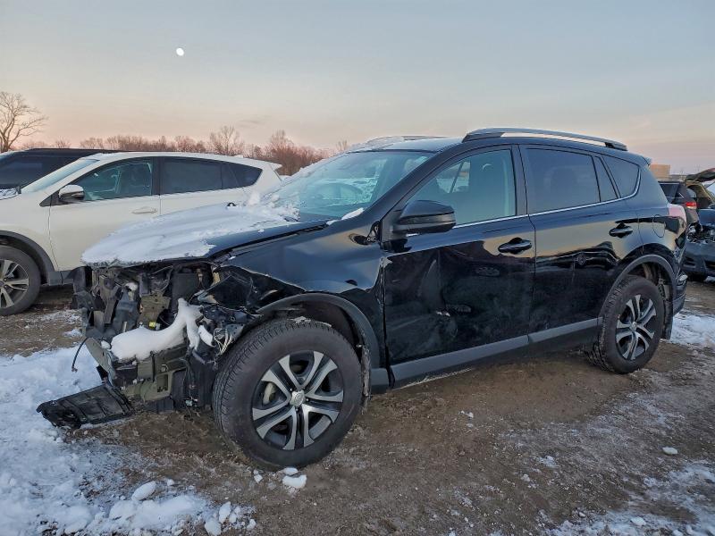 Photo 1 from auction – 2018 TOYOTA RAV4 LE with VIN 2T3BFREV0JW807714