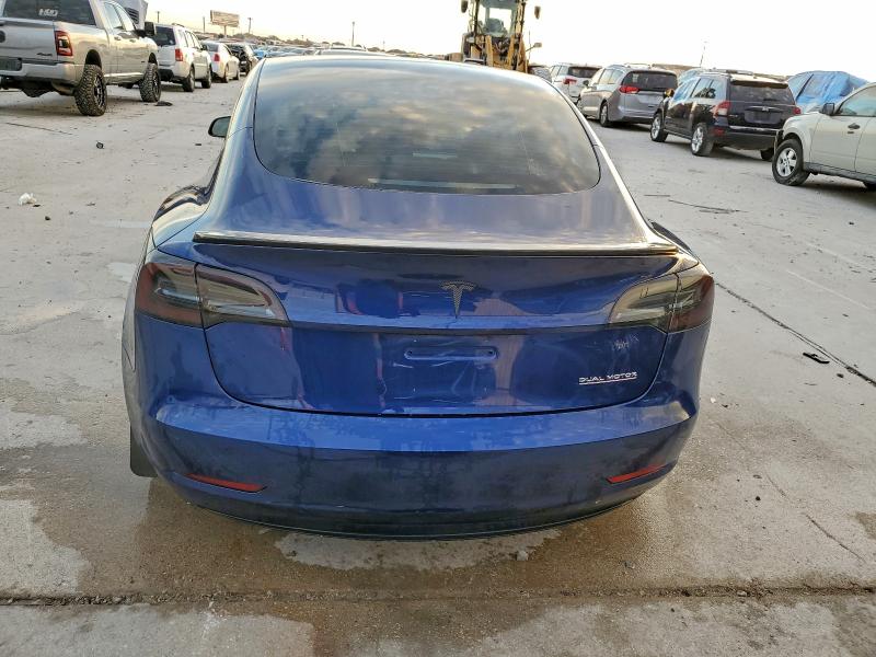 Photo 6 from auction – 2022 TESLA MODEL 3 with VIN 5YJ3E1EC4NF328585
