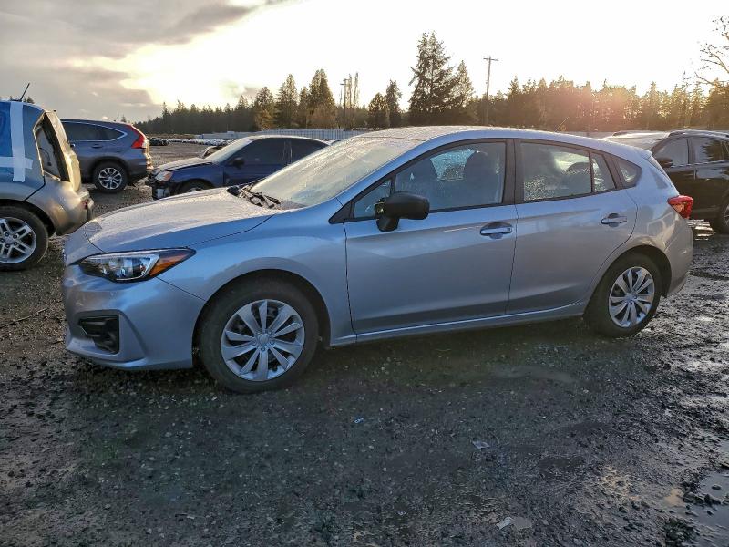 SUBARU IMPREZA 2019 with VIN 4S3GTAA6XK3750120 - Photo from auction