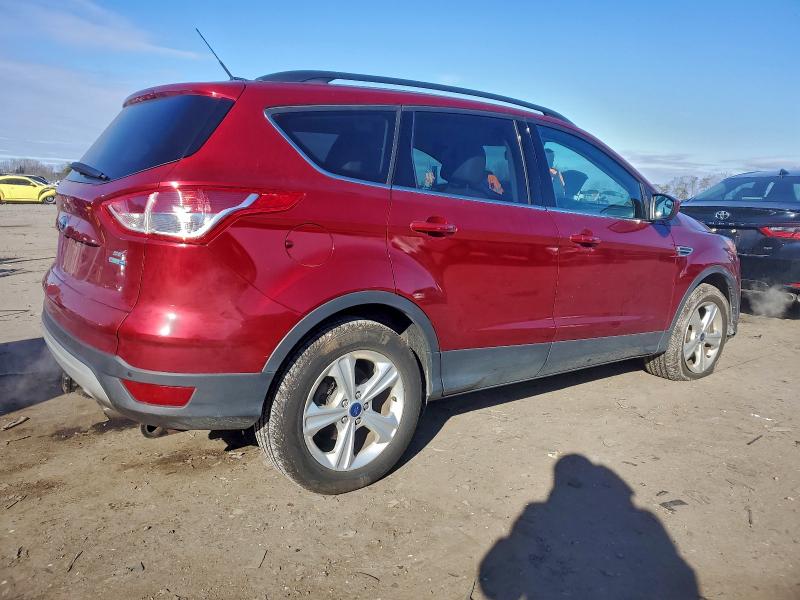 Photo 3 from auction – 2014 FORD ESCAPE SE with VIN 1FMCU9GX7EUA60068