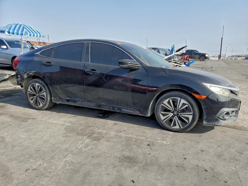 Photo 4 from auction – 2016 HONDA CIVIC EXL with VIN 2HGFC1F73GH643946