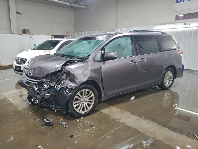 Photo 1 from auction – 2014 TOYOTA SIENNA XLE with VIN 5TDYK3DC3ES461524