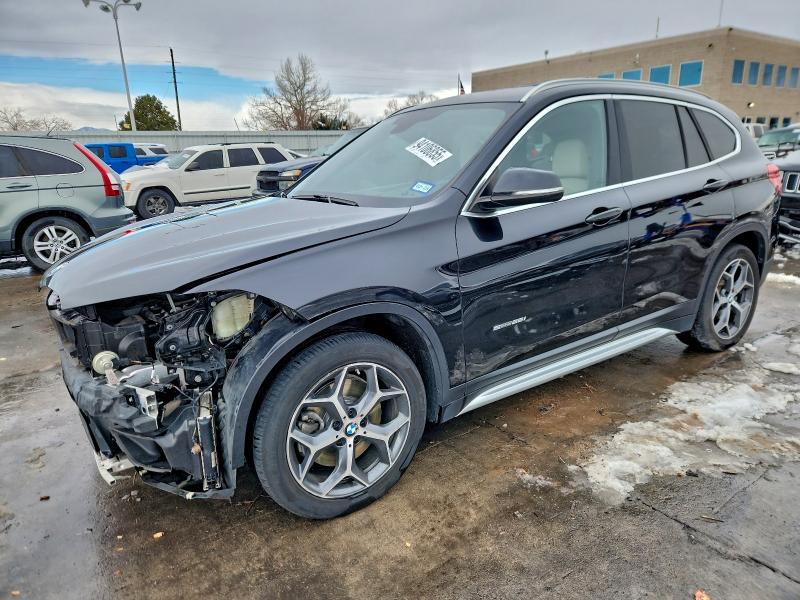 BMW X1 2018 with VIN WBXHU7C30J5H40390 - Photo from auction