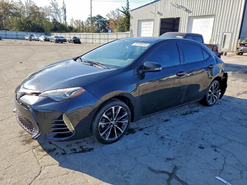 TOYOTA COROLLA L 2017 with VIN 5YFBURHE6HP737495 - Photo from auction