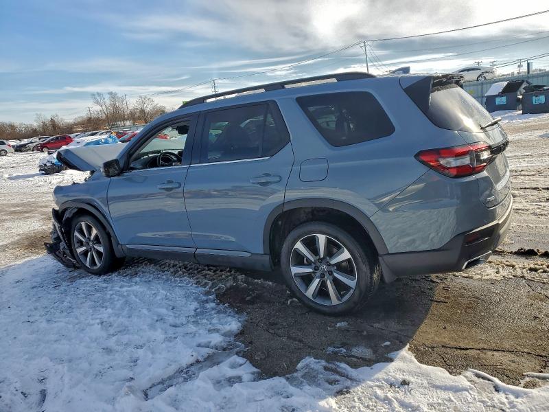 Photo 2 from auction – 2023 HONDA PILOT ELIT with VIN 5FNYG1H82PB013021