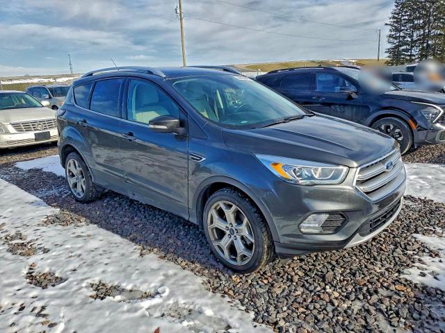 Photo 4 from auction – 2017 FORD ESCAPE TIT with VIN 1FMCU9J91HUB28251