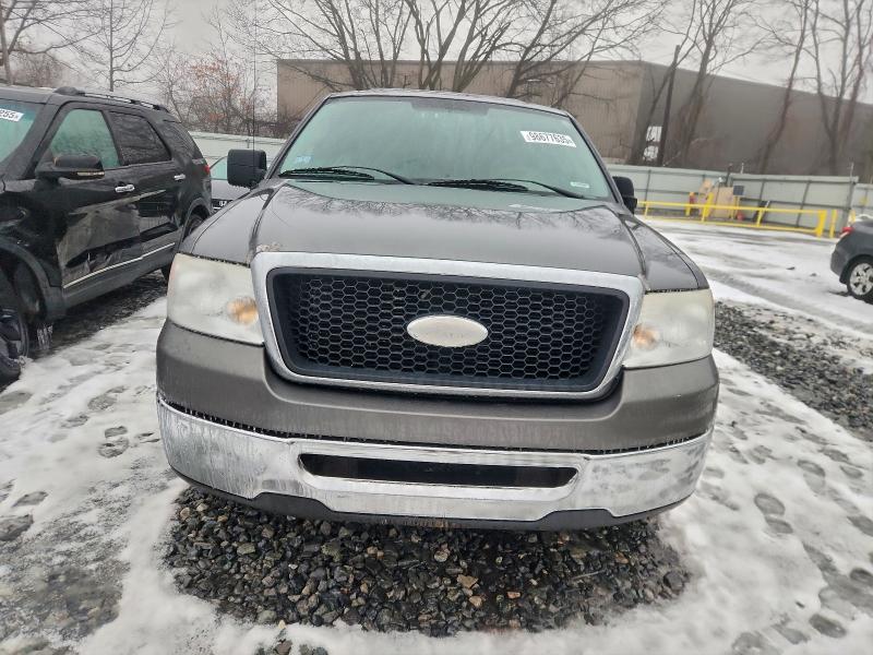 Photo 5 from auction – 2007 FORD F150 with VIN 1FTRF12247NA79003