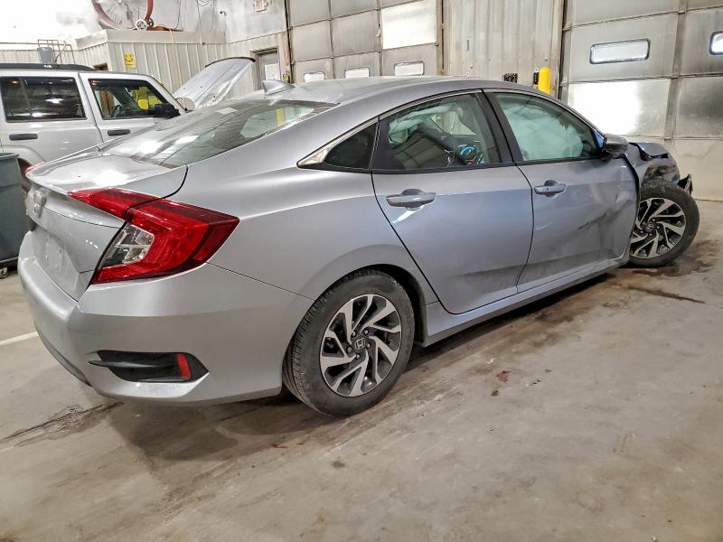 Photo 3 from auction – 2017 HONDA CIVIC EX with VIN 19XFC2F74HE014990