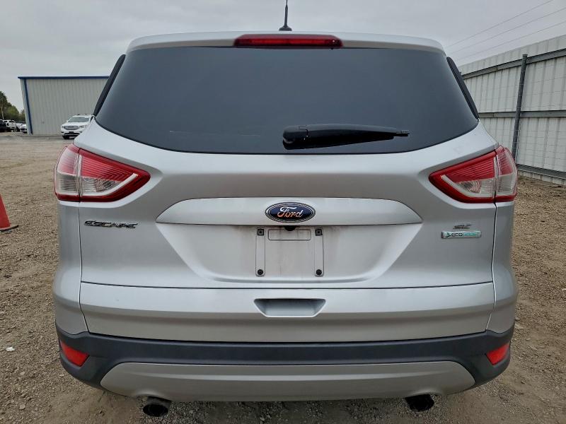 Photo 6 from auction – 2016 FORD ESCAPE SE with VIN 1FMCU0GXXGUB36591