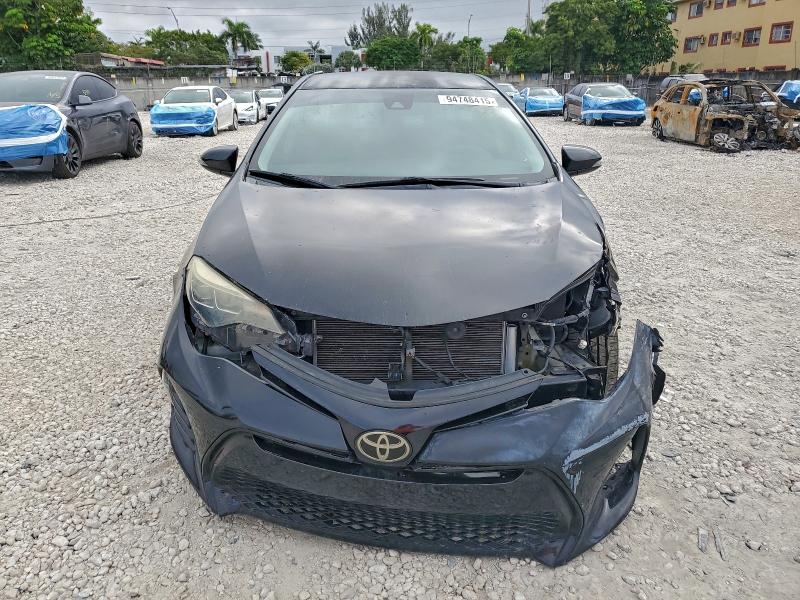 Photo 5 from auction – 2017 TOYOTA COROLLA L with VIN 5YFBURHEXHP714463