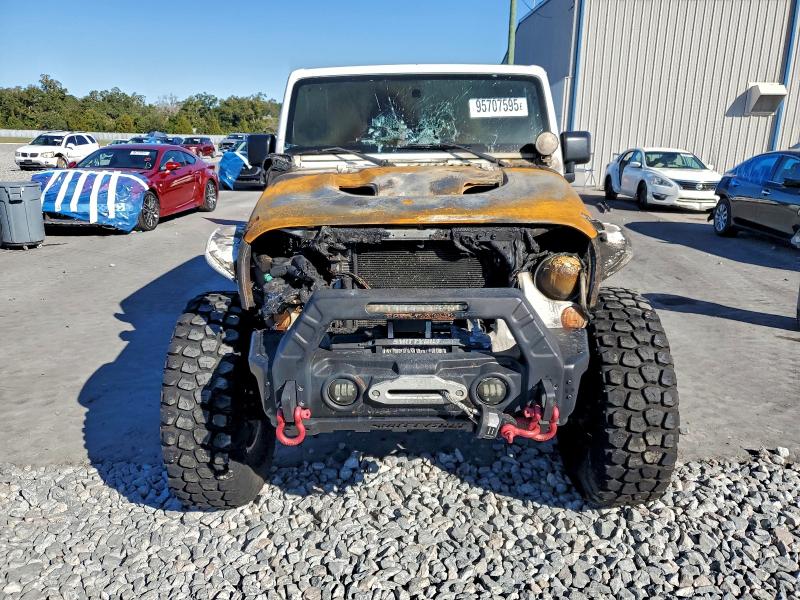 Photo 5 from auction – 2013 JEEP WRANGLER U with VIN 1C4BJWFG3DL577770