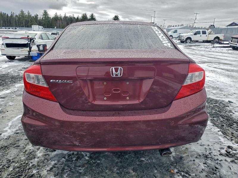 Photo 6 from auction – 2012 HONDA CIVIC LX with VIN 2HGFB2F42CH015711