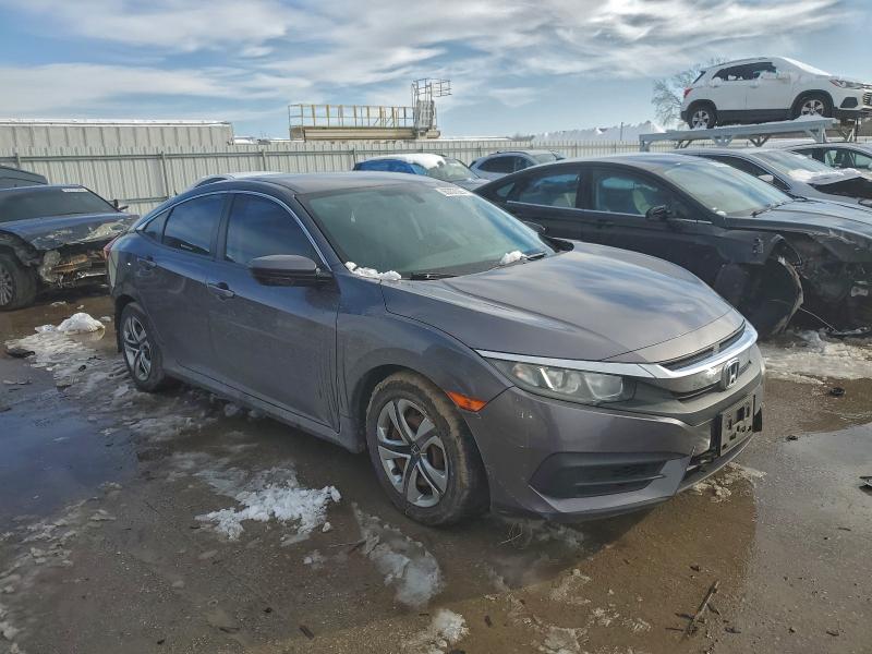 Photo 4 from auction – 2016 HONDA CIVIC LX with VIN 19XFC2F52GE010336