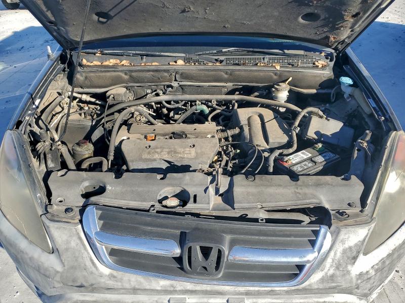 Photo 12 from auction – 2002 HONDA CR-V with VIN JHLRD68412C016959