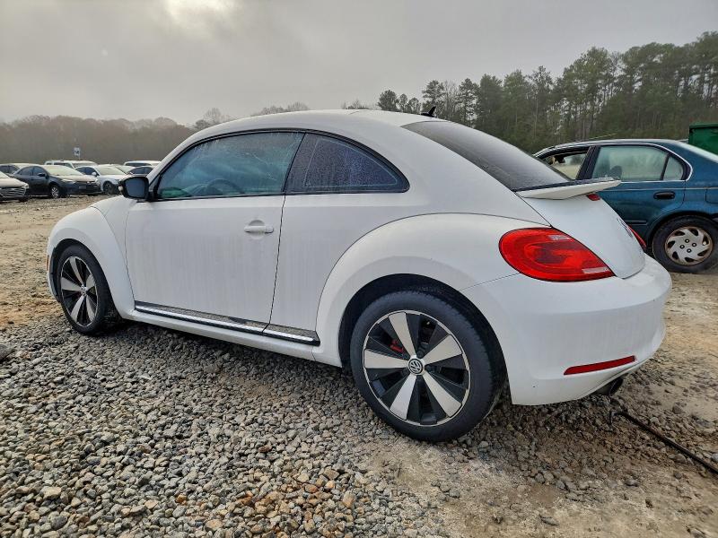 Photo 2 from auction – 2012 VOLKSWAGEN BEETLE TUR with VIN 3VWVA7AT9CM619022