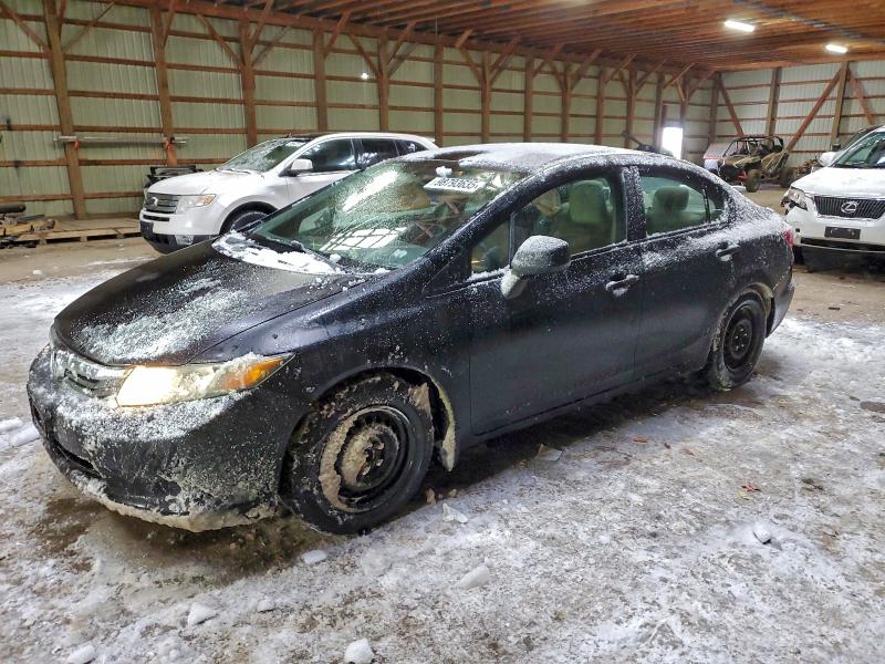HONDA CIVIC LX 2012 with VIN 2HGFB2F45CH034382 - Photo from auction