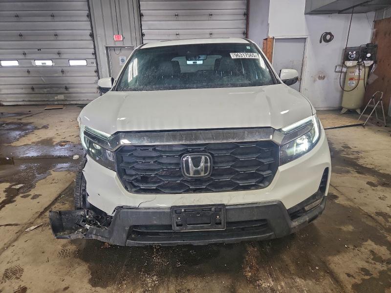 Photo 5 from auction – 2023 HONDA PASSPORT E with VIN 5FNYF8H53PB013479