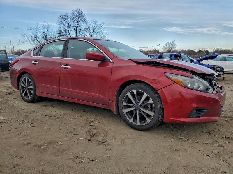 Photo 4 from auction – 2016 NISSAN ALTIMA 2.5 with VIN 1N4AL3AP7GN377159