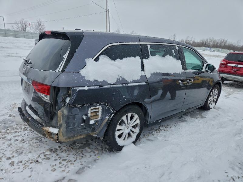 Photo 3 from auction – 2017 HONDA ODYSSEY EX with VIN 5FNRL5H60HB017589