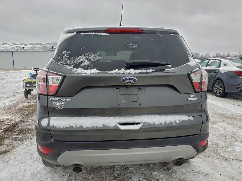 Photo 6 from auction – 2018 FORD ESCAPE SE with VIN 1FMCU0GD3JUD01765