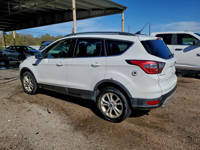 Photo 2 from auction – 2018 FORD ESCAPE with VIN 1FMCU9HD7JUD08334