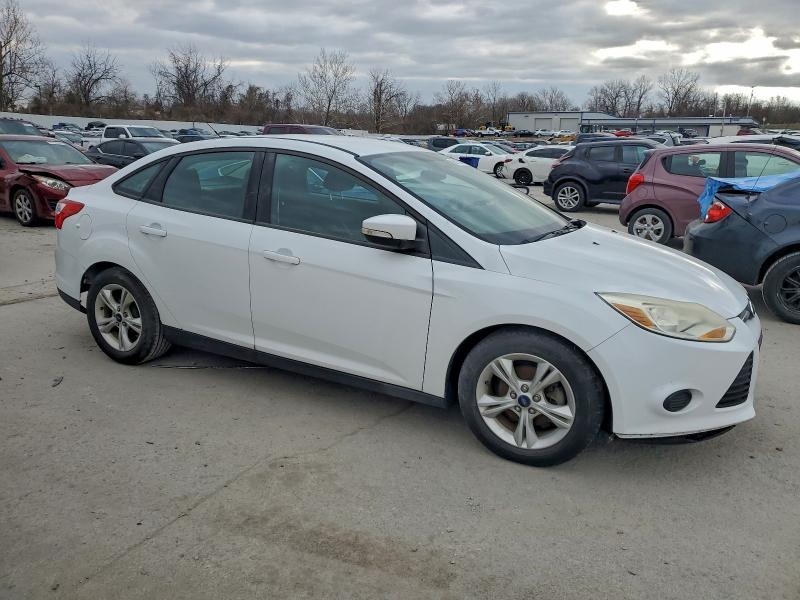 Photo 4 from auction – 2014 FORD FOCUS with VIN 1FADP3F26EL436449
