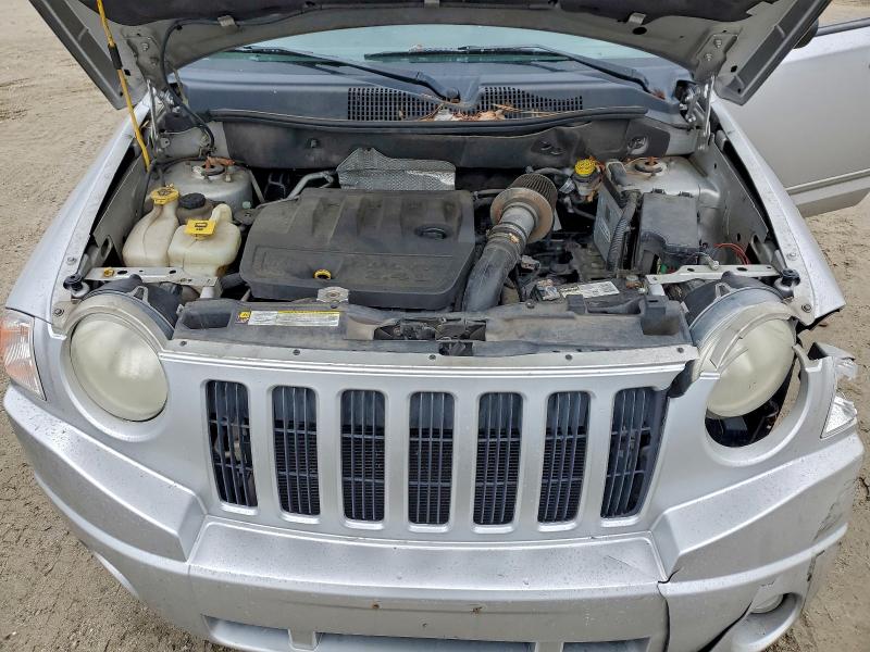 Photo 12 from auction – 2010 JEEP COMPASS SP with VIN 1J4NT4FB6AD522018