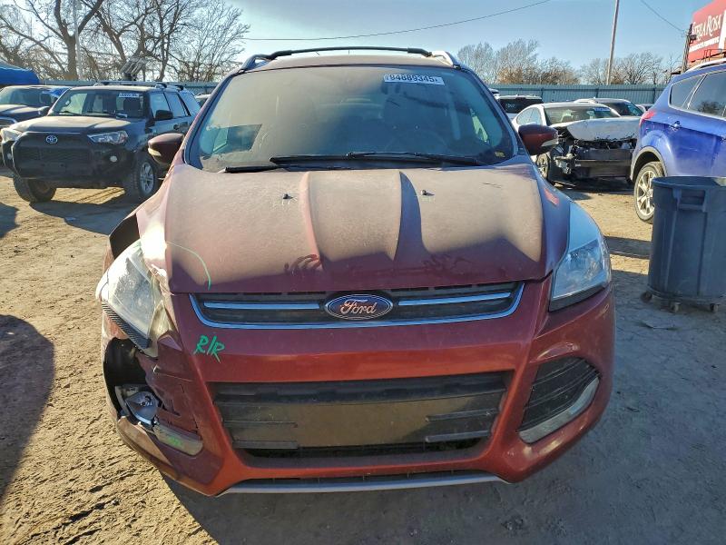 Photo 5 from auction – 2014 FORD ESCAPE with VIN 1FMCU0J94EUA52127