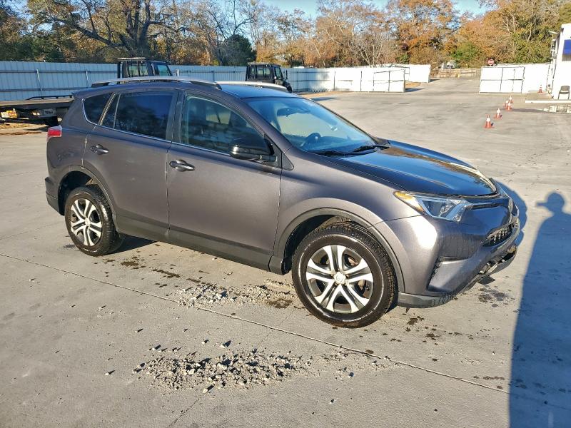 Photo 4 from auction – 2018 TOYOTA RAV4 LE with VIN JTMZFREV0JJ752307