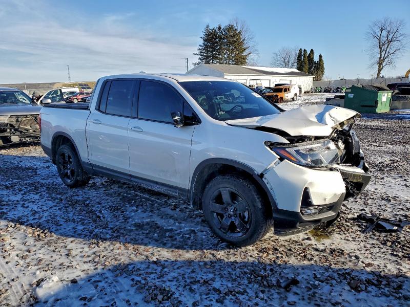 Photo 4 from auction – 2024 HONDA RIDGELINE with VIN 5FPYK3F8XRB016157
