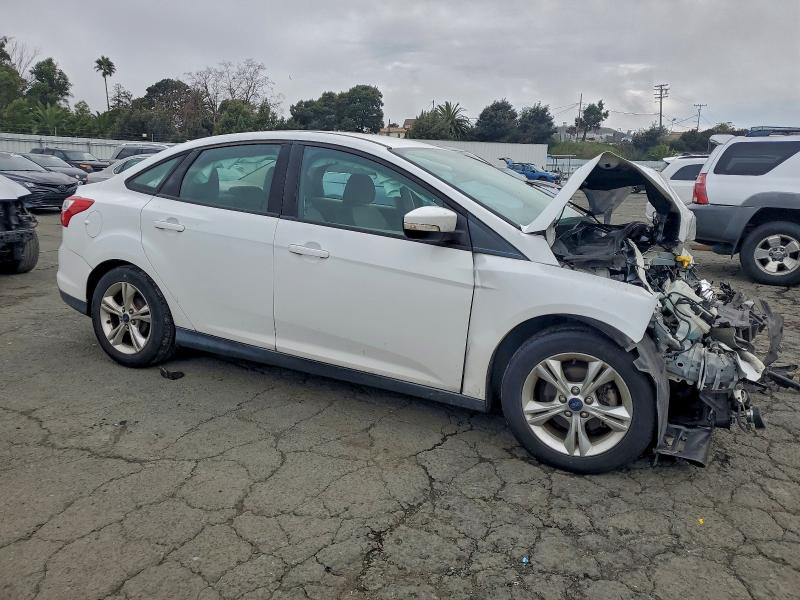 Photo 4 from auction – 2013 FORD FOCUS SE with VIN 1FADP3F26DL302569