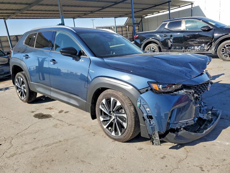 Photo 4 from auction – 2025 MAZDA CX-50 PREM with VIN 7MMVAAEW3SN104042