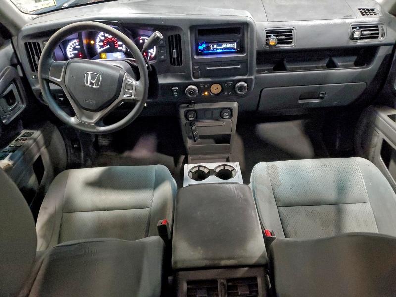 Photo 8 from auction – 2010 HONDA RIDGELINE with VIN 5FPYK1F20AB003289
