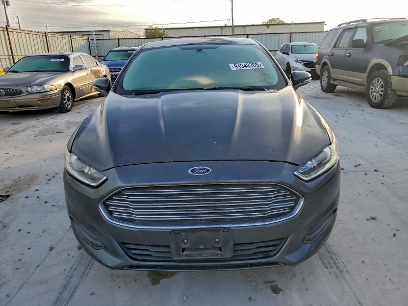 Photo 5 from auction – 2015 FORD FUSION with VIN 3FA6P0H76FR215081