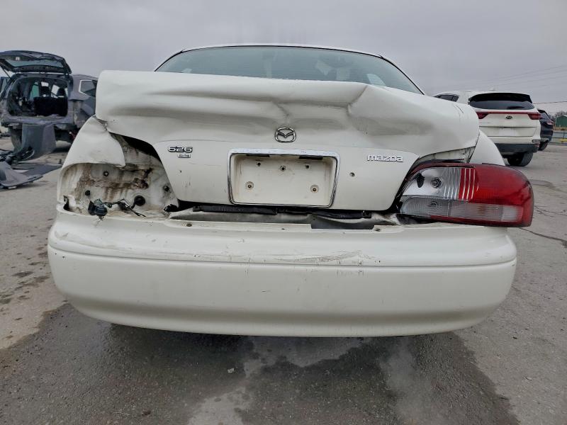 Photo 6 from auction – 1999 MAZDA 626 ES with VIN 1YVGF22C6X5822258