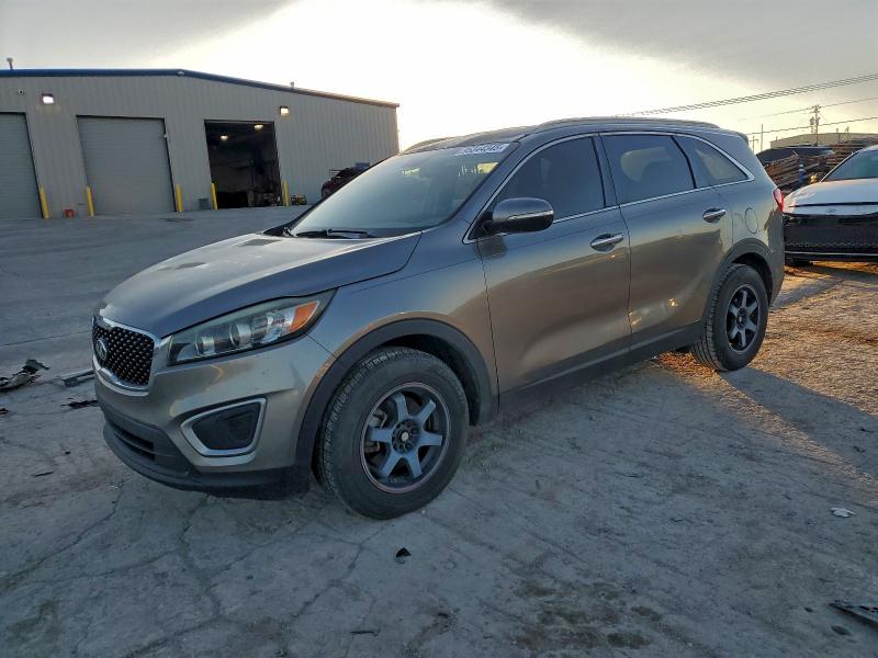 KIA SORENTO LX 2016 with VIN 5XYPG4A32GG028008 - Photo from auction
